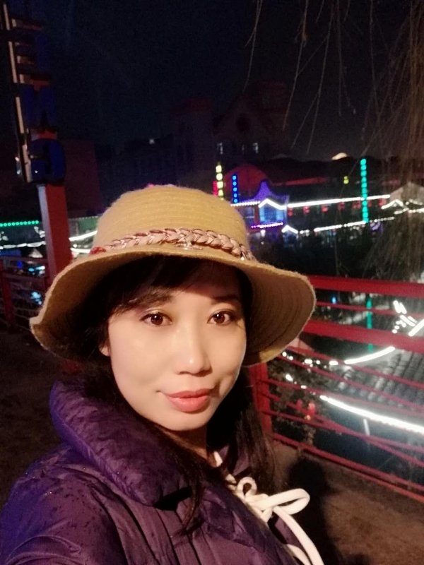 阳光明媚的第一张照片--信阳相亲服务中心