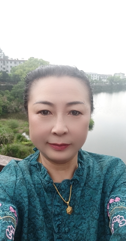 雨中情的第一张照片--信阳相亲服务中心